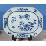 An 18th century Chinese blue and white serving dish of octagonal shape decorated with flowers, 14" x