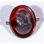 Antique carved amber glass cameo, depicting a helmeted warrior