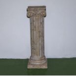 A pottery plant stand/pillar