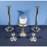 Two pair of candlesticks and one other