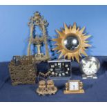 A collection of brass ware and clocks