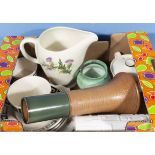 A box containing pottery items