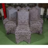 A set of 8 upholstered dining chairs