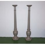 A tall pair of wooden stands
