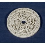 A Chinese Cantonese carved ivory roundel, circa 1820's