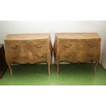 A pair of bedside cabinets