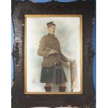 An oak framed over painted photograph of a Scottish soldier