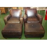 Two leather arm chairs with matching stools