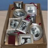 A box of miniature photograph frames