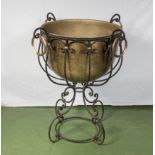 a large iron and brass planter