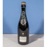 A bottle of Grande Annee 1990 Bollinger Champagne, 75cl, 12% vol. The foil around the neck and