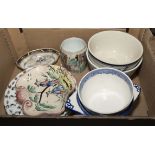 A box containing tureens and other table ware