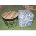 A small table and a pouffe cube