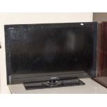 A Toshiba 32 inch Television with remote