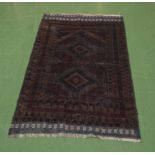 An old Baluchi rug, size 127cm x 80cm
