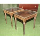 A pair of side tables