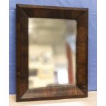 A small rosewood framed mirror
