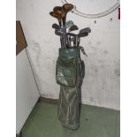 A golf bag and clubs