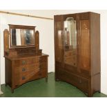 An oak mirrored door wardrobe and dressing table