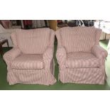 A pair of over stuffed armchairs