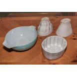 Three vintage jelly moulds and Pyrex dish