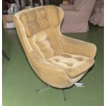 A retro egg chair, vintage swivel armchair