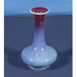 A small Chinese oxblood flambe vase, 15cm