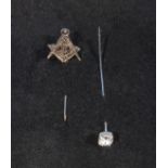 A 9ct gold Masonic tie pin together with a small diamond tie pin