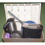 A box of kitchen items