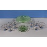 Ten small glasses and two plates