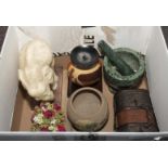 A box containing pottery items