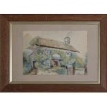 An oak framed watercolour of a country cottage and garden, signed