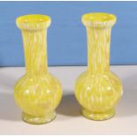 A pair of lemon glass vases