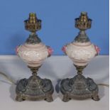 A pair of oil lamps