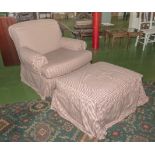 An over stuffed armchair and footstool