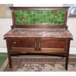 A Edwardian tile back and marble top washstand.