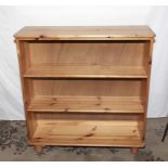 A pine open bookcase