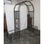 A metal garden Arbor