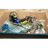 A box containing glass animals