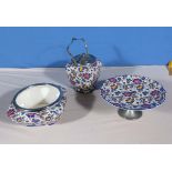 Three pieces of chintz pattern pottery table ware