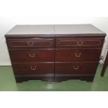 A pair of bedside drawers