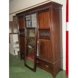 A three door mahogany wardrobe