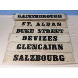 A number of vintage bus/tram destination signs, possibly American