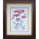 An oak framed print of poppies