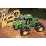 A toy bulldozer and a tractor