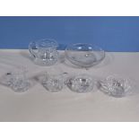 A glass bowl and pieces of crystal glass