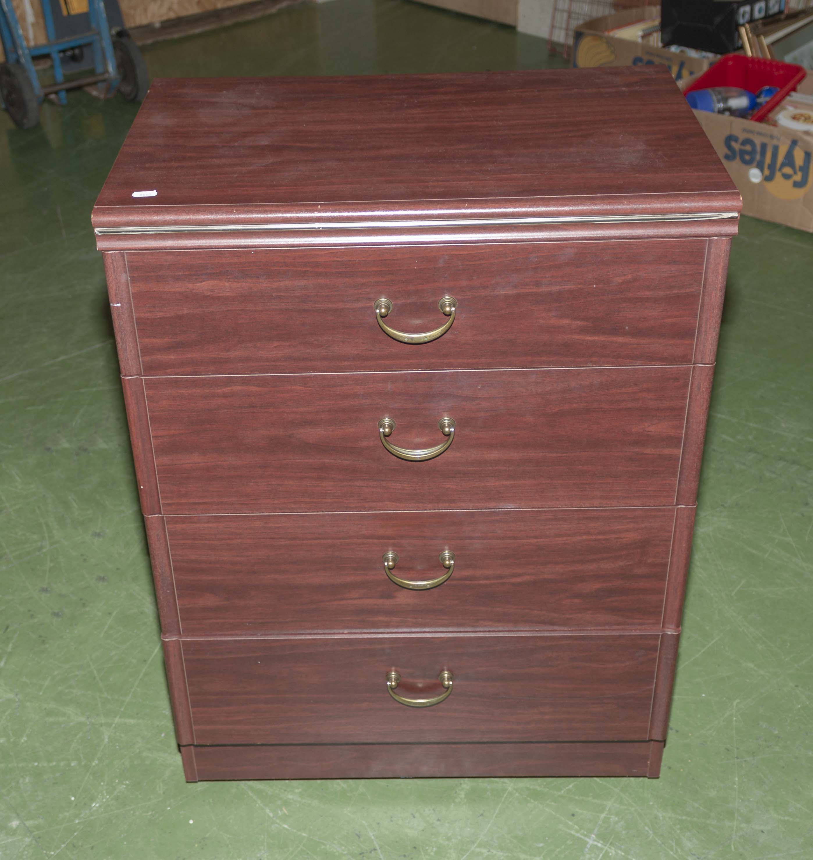A small chest of four drawers