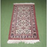 A red ground rug