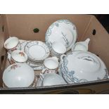 A box of assorted pottery table ware
