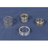 Four silver napkin rings, various makers and dates. Total weight 57gms